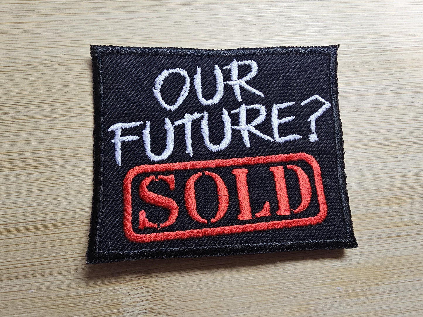 Our Future is Sold Iron on Embroidered Patch Politics Leftist Patches