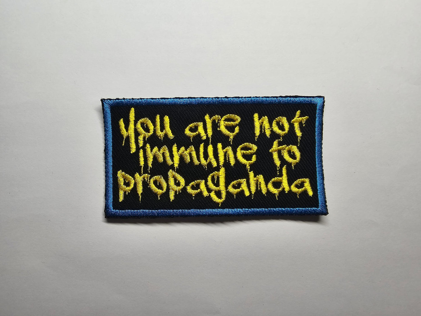 You are not immune to propaganda Embroidered Patch