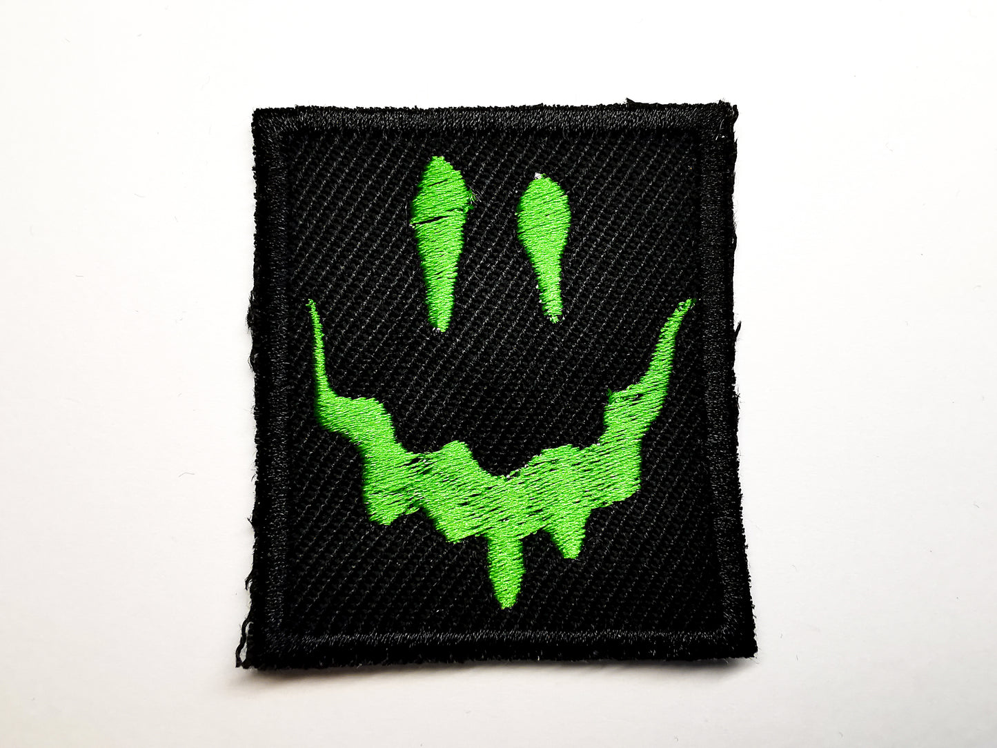 Melting Face Embroidered Patch Emerald Green