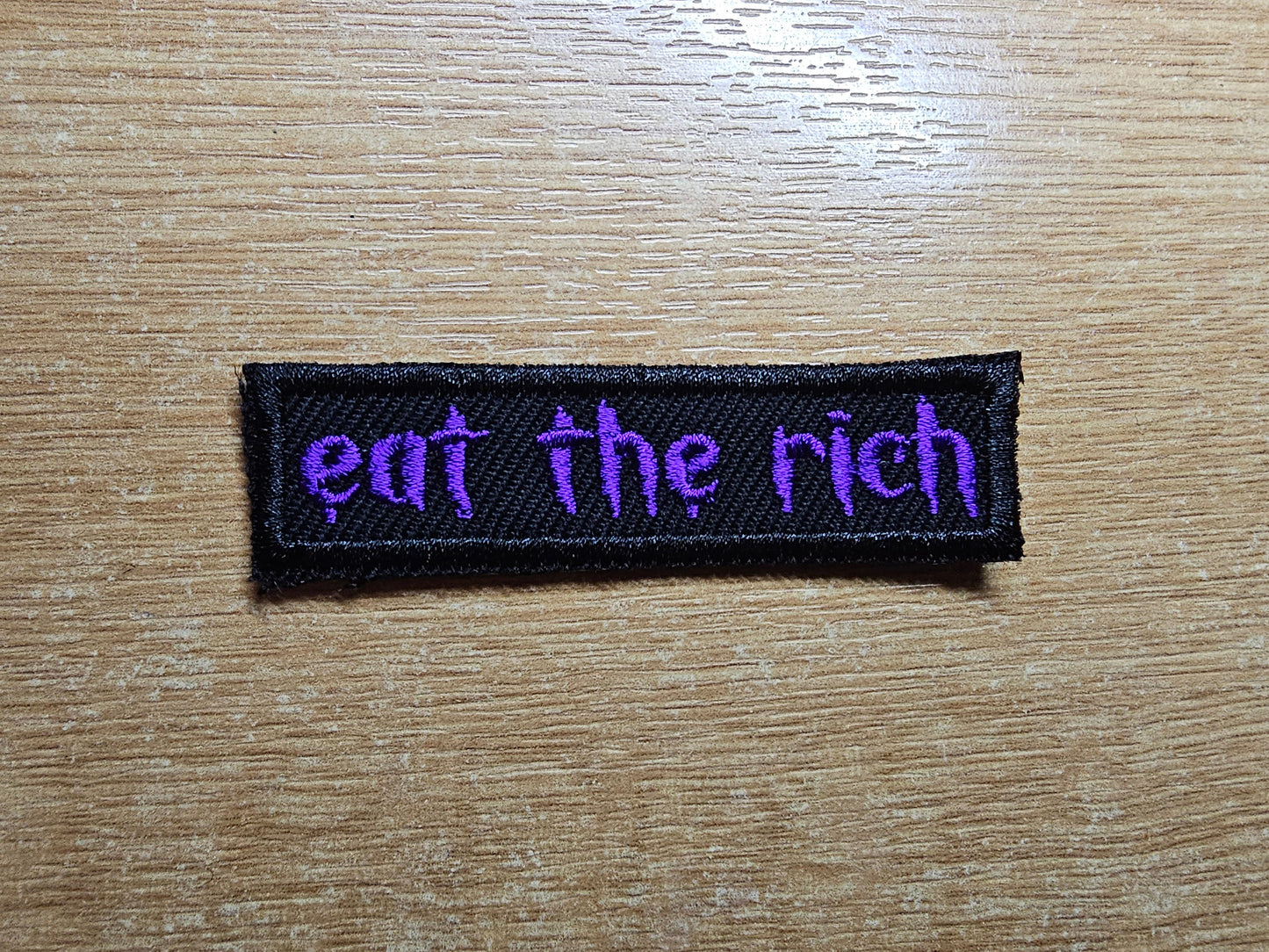 Eat The Rich MINI Embroidered Iron On Patch Politics Punk and Goth - Very small! Purple and Black