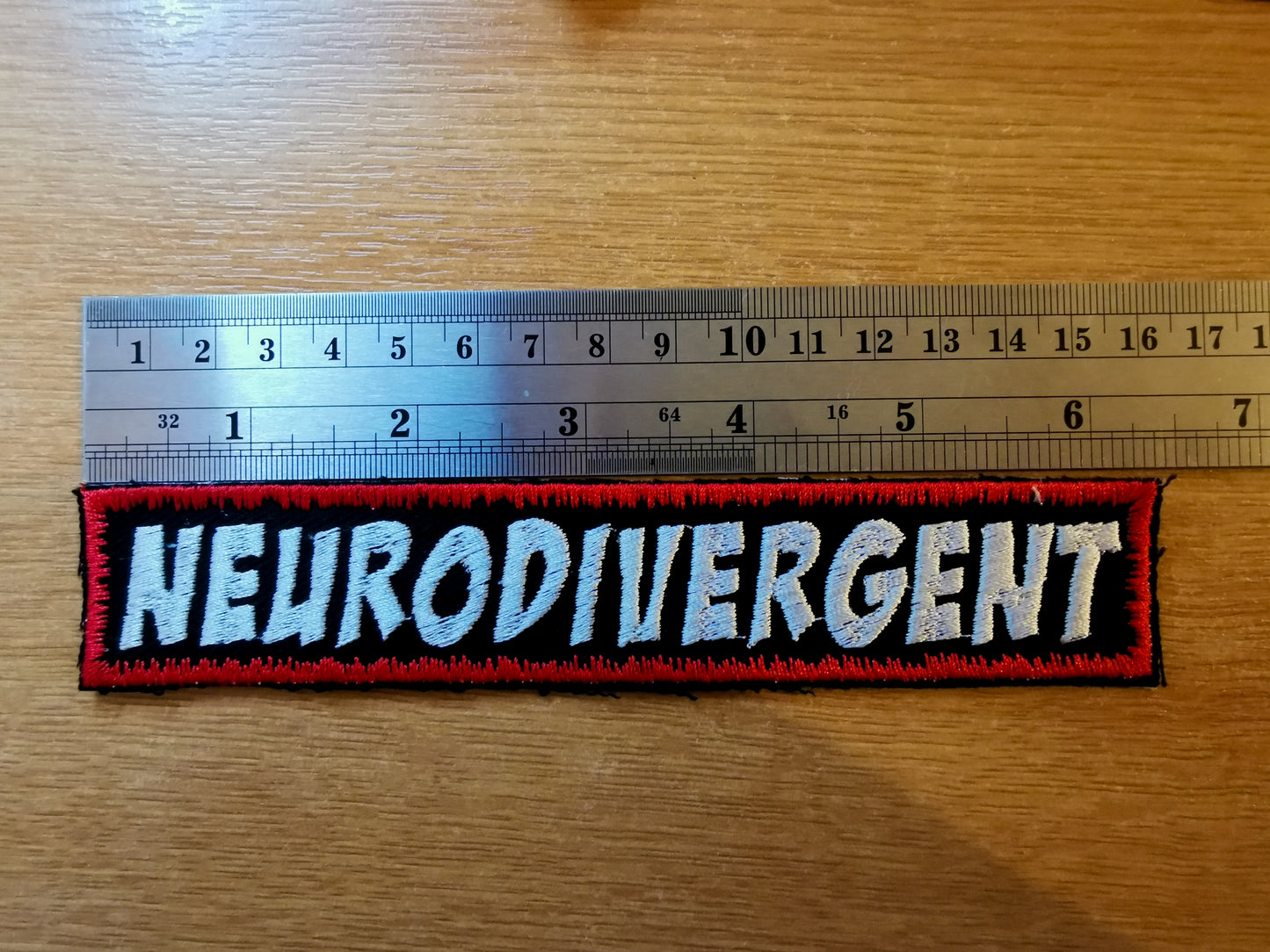 Neurodivergent Embroidered Patch Long Red Snow Comic Book Style