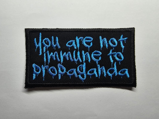 You are not immune to propaganda Embroidered Patch