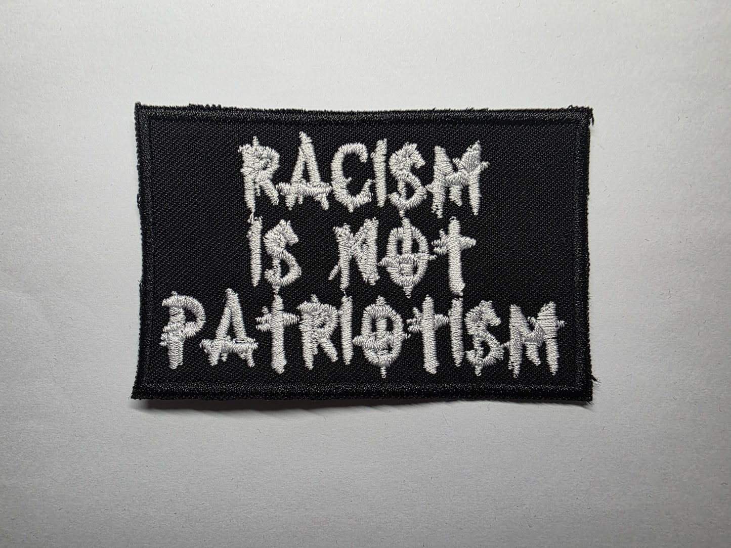 Racism is Not Patriotism Anti-Hate Embroidered Patch