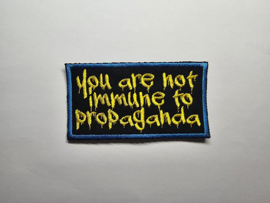 You are not immune to propaganda Embroidered Patch