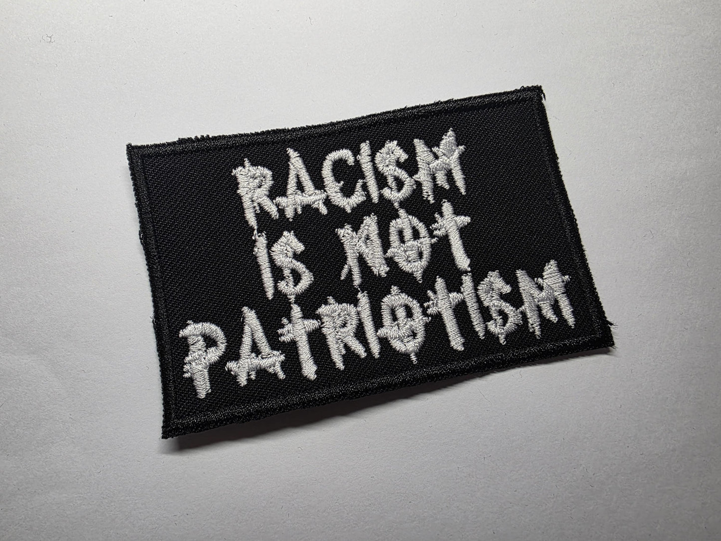 Racism is Not Patriotism Anti-Hate Embroidered Patch