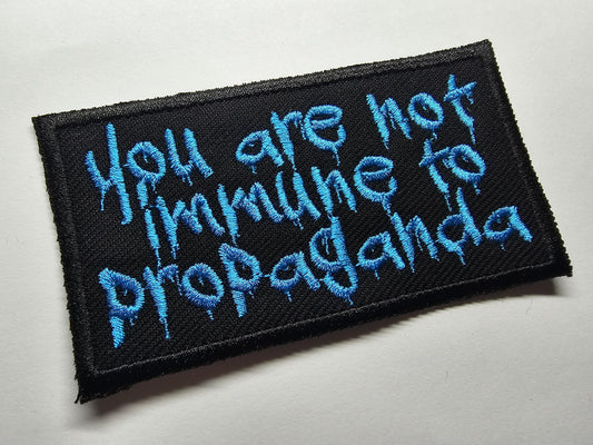 You are not immune to propaganda Embroidered Patch