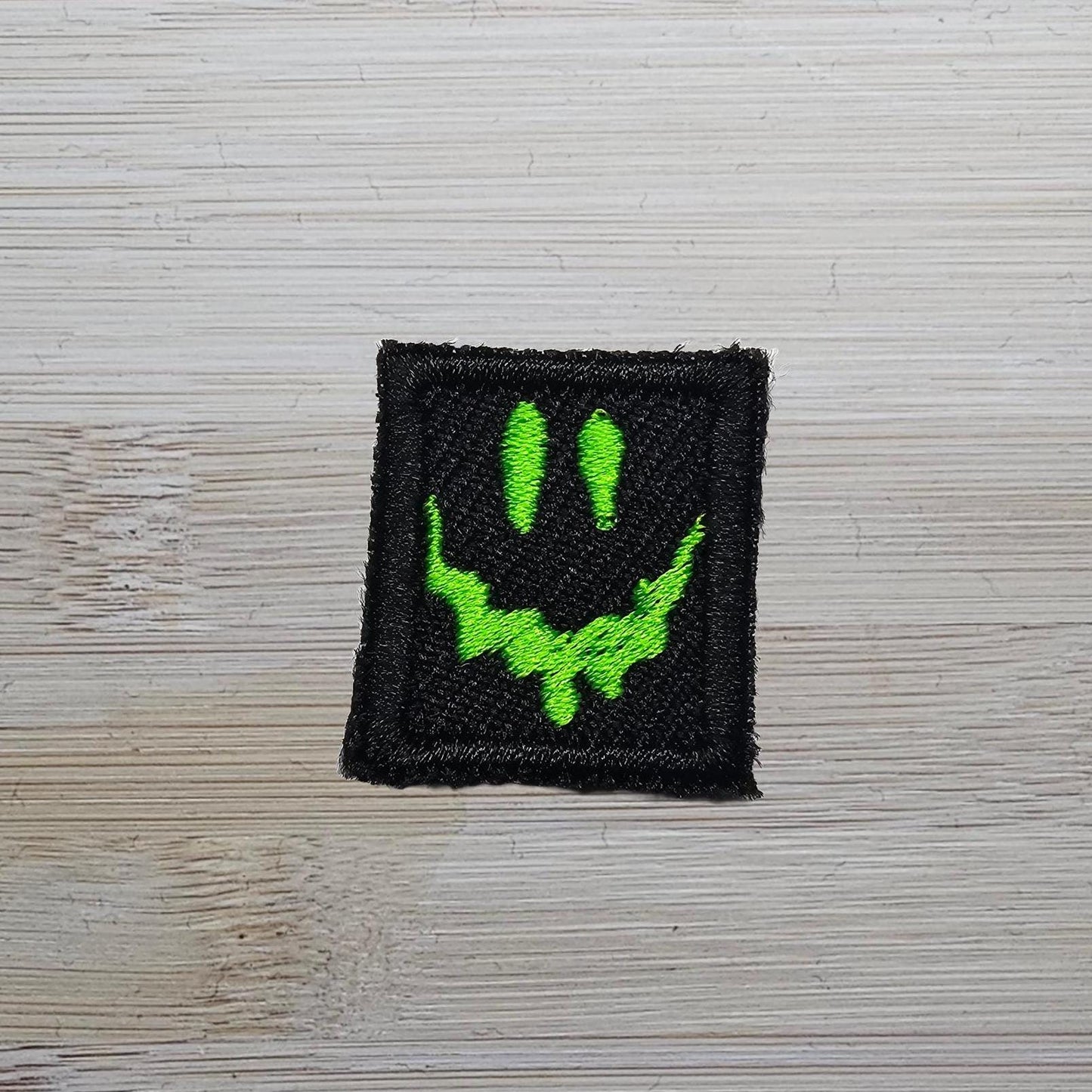 TINY Green Patch Melting Face Iron On Embroidered Patch For Horror Movie Fans and Gamers Metal Music