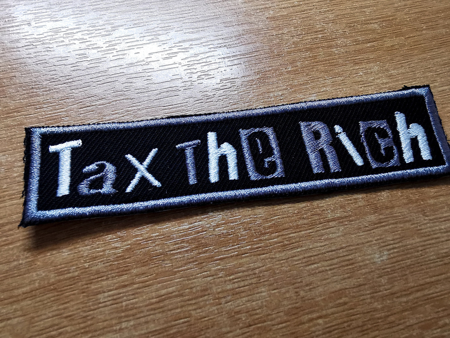 Tax The Rich Embroidered Iron On Patch Politics Punk Pewter Grey