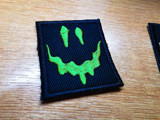 Melting Face Embroidered Patch Emerald Green